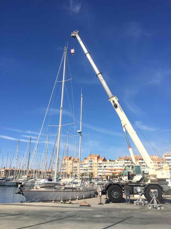 Crane removing the masts